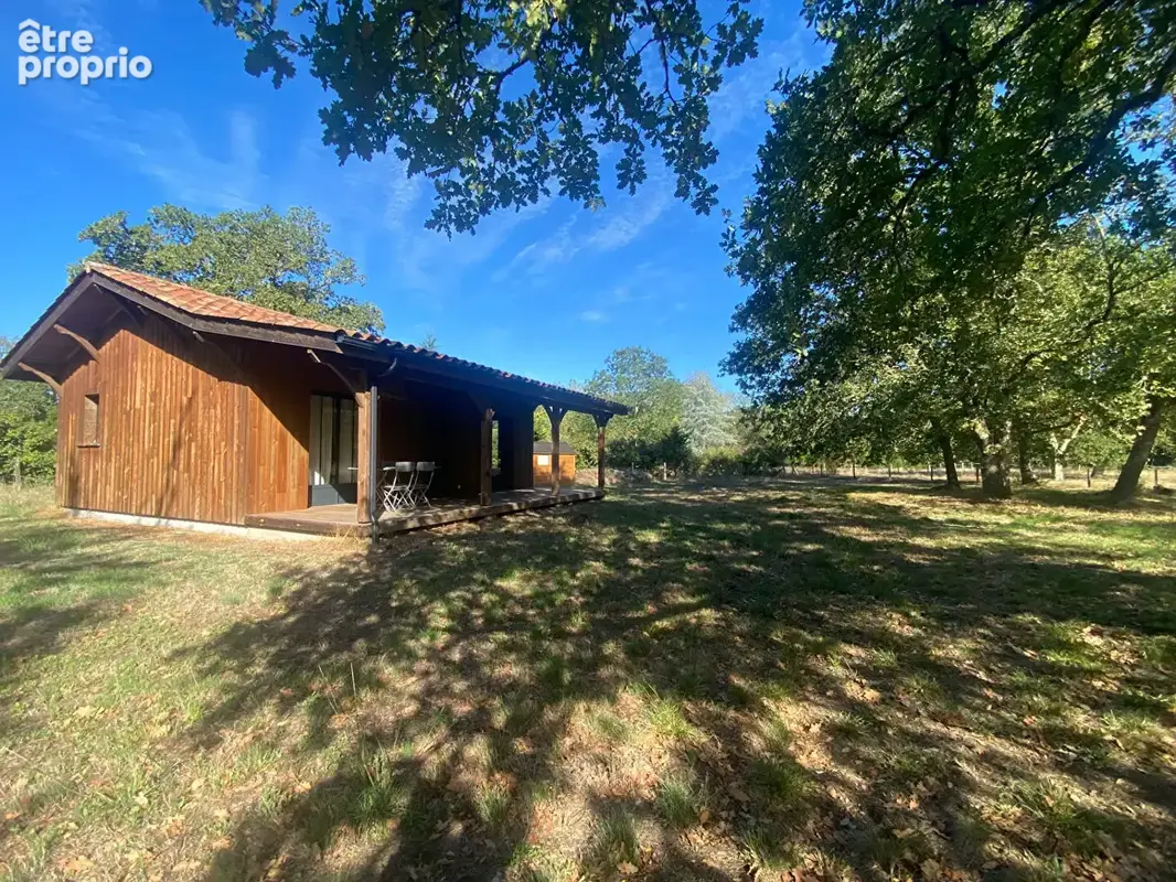 Pissos- maison bois dans un ecrin de verdure - photo 1