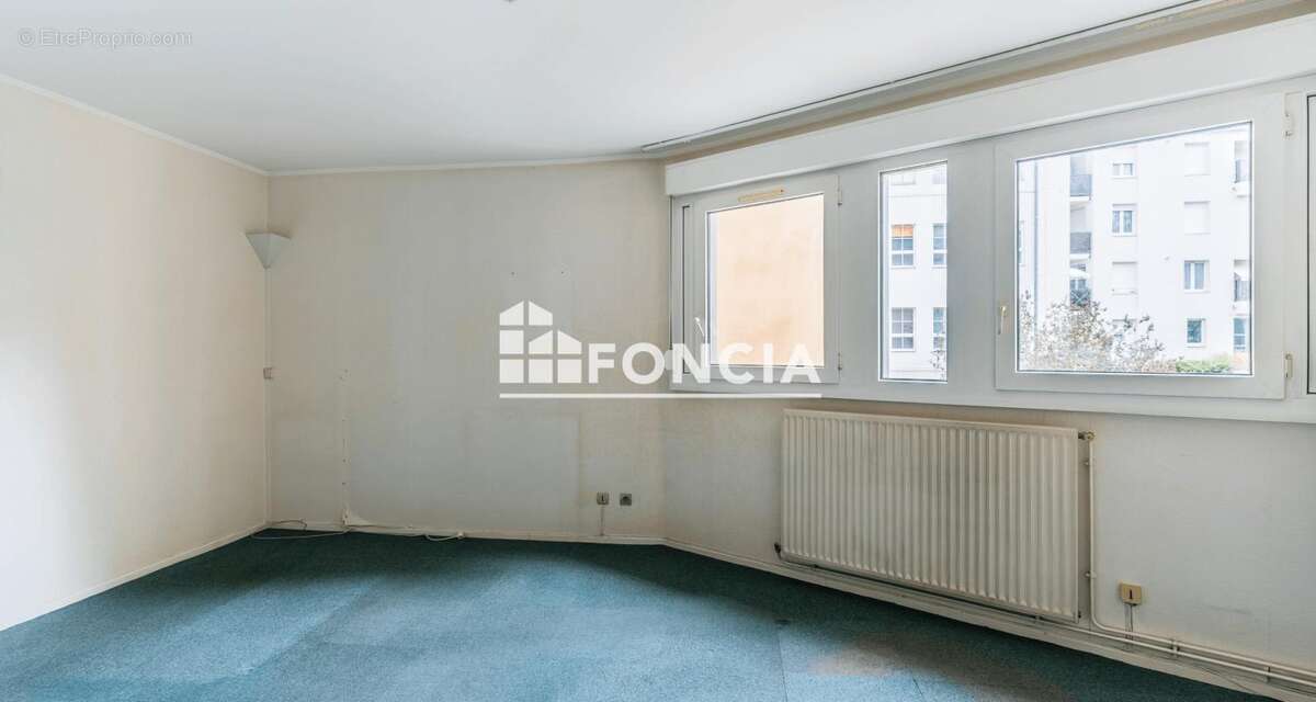 45 m² Montigny-lès-Metz – T2 à rénover avec parking intérieur - photo 5