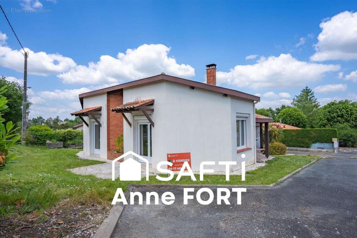 Photo 2 - Maison à LAROQUE-TIMBAUT