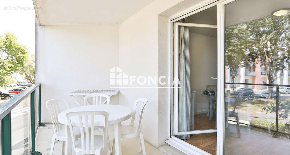 Appartement T2 avec balcon, piscine et parking privatif - photo 6