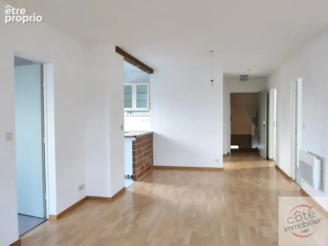 Appartement sous combles dans maison individuelle comprenant trois appartements - photo 5