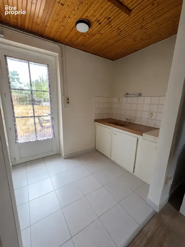 Longère en pierre louée   73,85 m2   terrain 1 078 m2   garage - photo 3