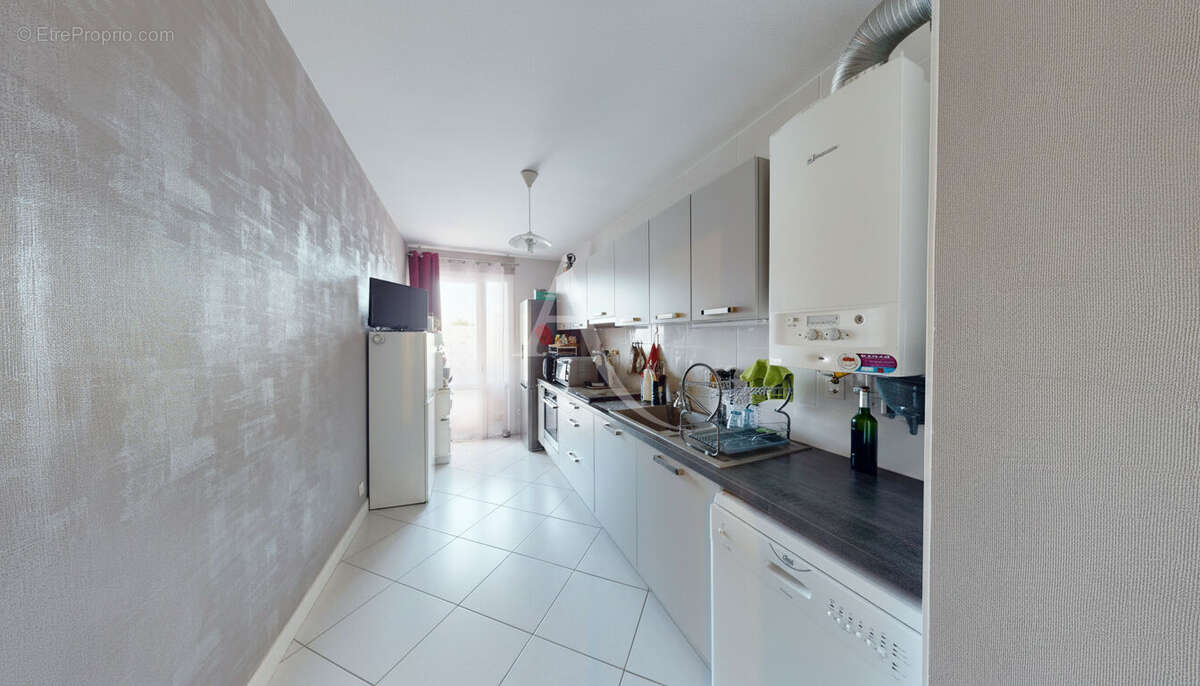 Appartement 3 pièces à vendre à Saint-Jean-de-Braye, 2 chambres, balcon, parking et cave - photo 3