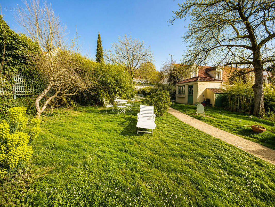 Maison  TRIEL-SUR-SEINE 6 pièce(s) 121 m² - photo 18