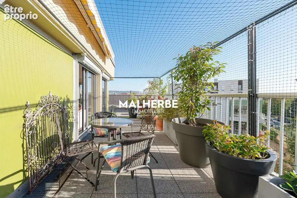 Dernier etage avec terrasse d'exception - photo 9