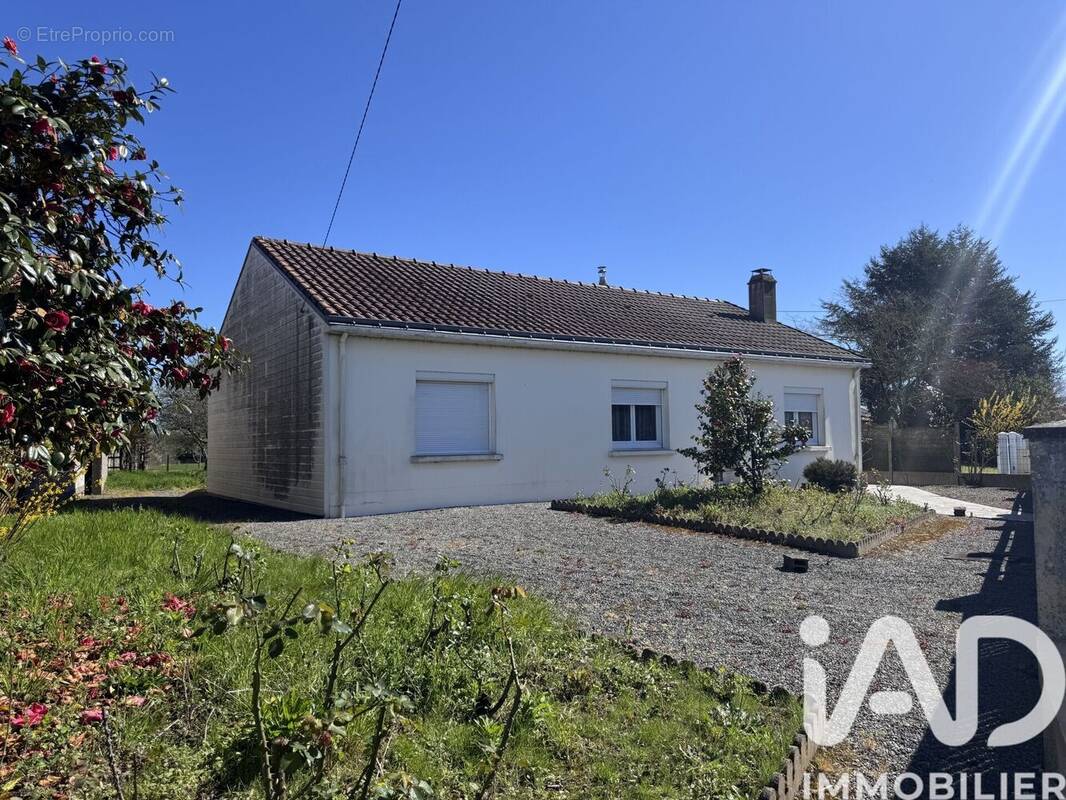 Photo 1 - Maison à BOUGUENAIS