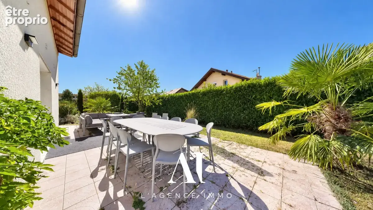 Maison 7 pièces 165 m² à vendre à Cessy (01170) - photo 6