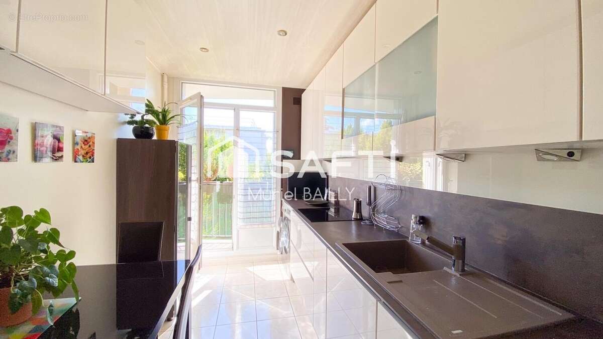 Photo 2 - Appartement à BALLAINVILLIERS