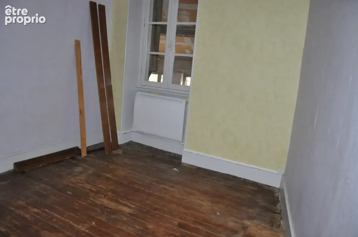 Immeuble de caractère en centre-ville, avec local commercial, duplex et appartement loué - photo 5