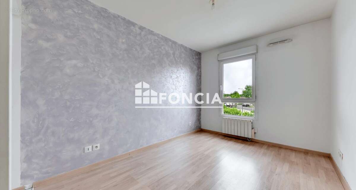 VAULX-EN-VELIN – T3 de 64 m² avec balcon et garage en résidence sécurisée de 2010 - photo 8