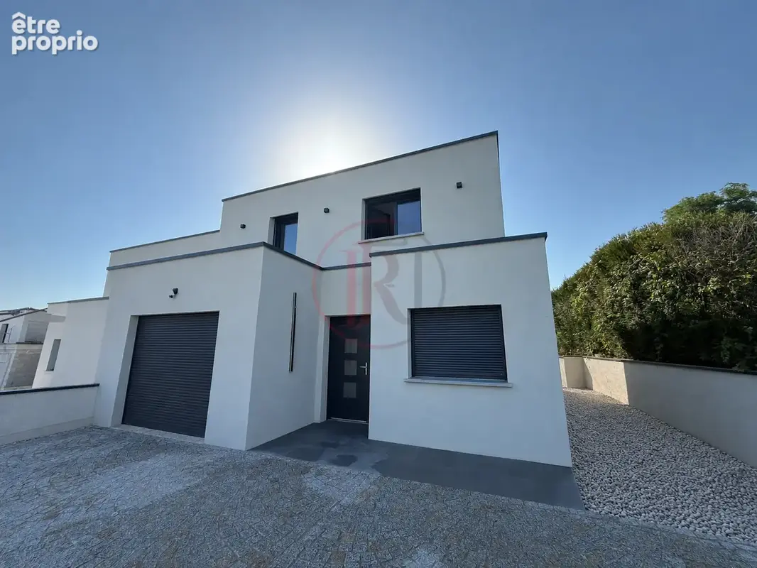 Maison à POUILLEY-LES-VIGNES