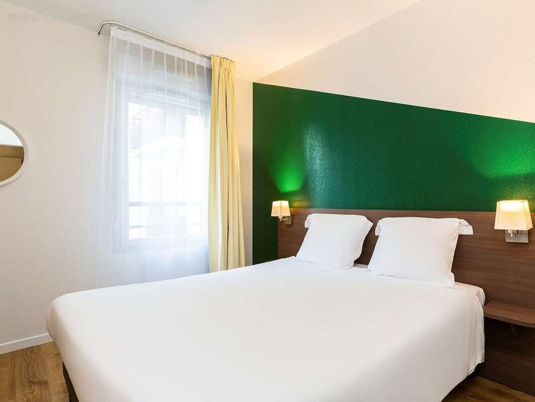 INVESTISSEMENT LOCATIF  CARRIERES SOUS POISSY - Résidence Aparthotel Adagio Access*** - 5,64% de rentabilité. - photo 4