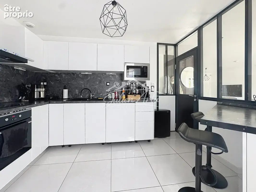 Maison 5 pièces 98 m² à vendre à Saint-Sebastien-Sur-Loire (44230) - photo 5