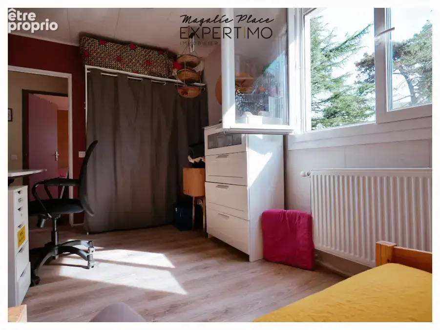 Appartement dans un environnement verdoyant calme avec cave et parking - photo 11