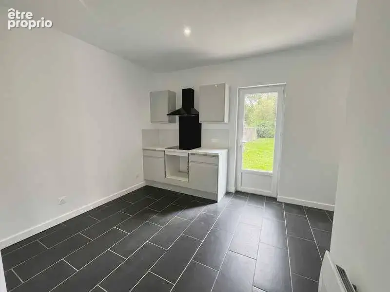 Maison 5 pièces 97 m² à vendre à Etrepagny (27150) - photo 5