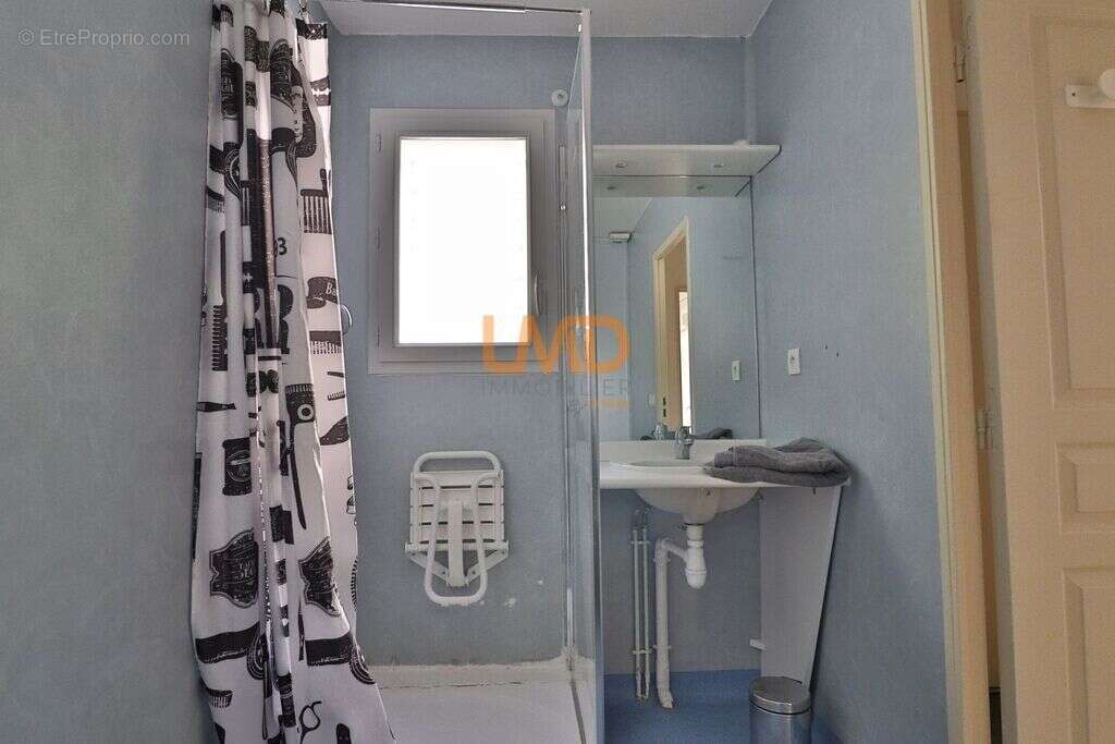Appartement 2 pièces de 38,86 m² au rez-de-chaussée - photo 8