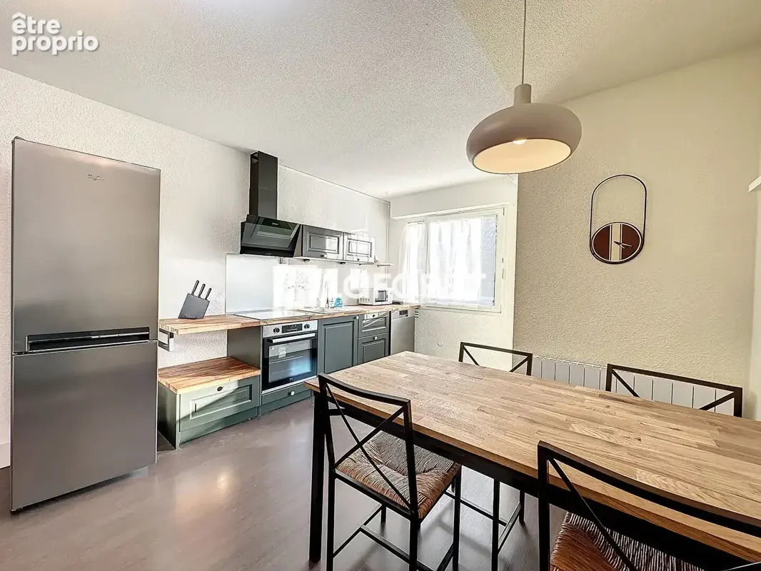 T5 de 83,01 m²  4 chambres  balcon  cave  au calme - photo 4