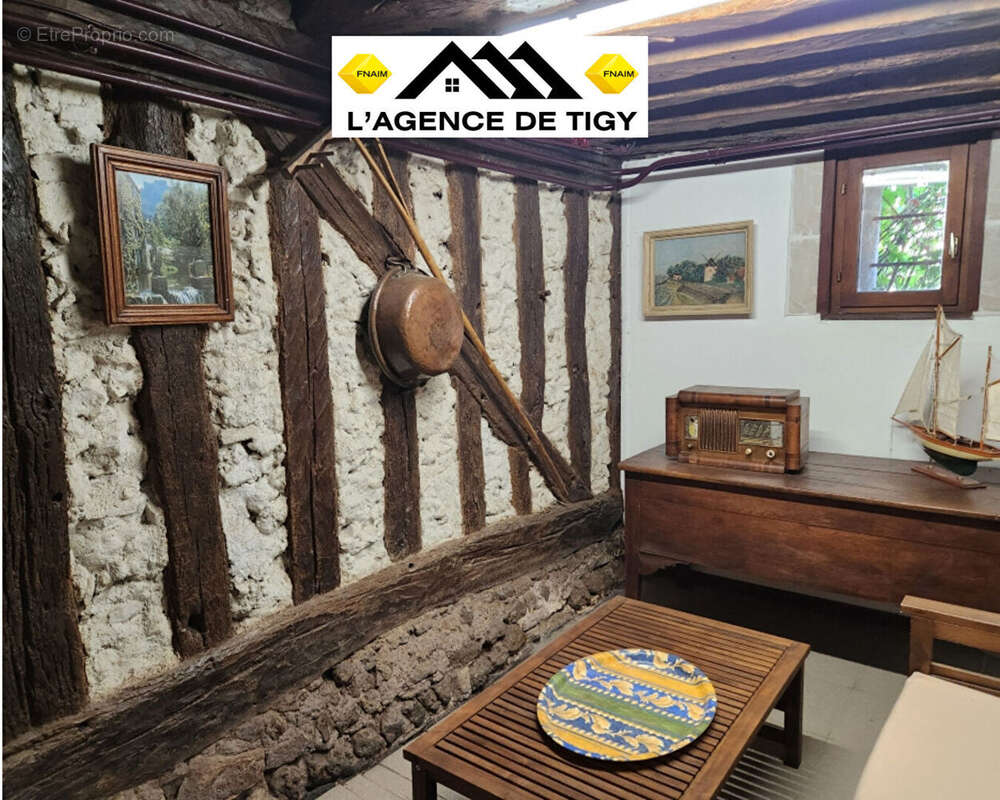 A vendre une charmante maison - photo 10
