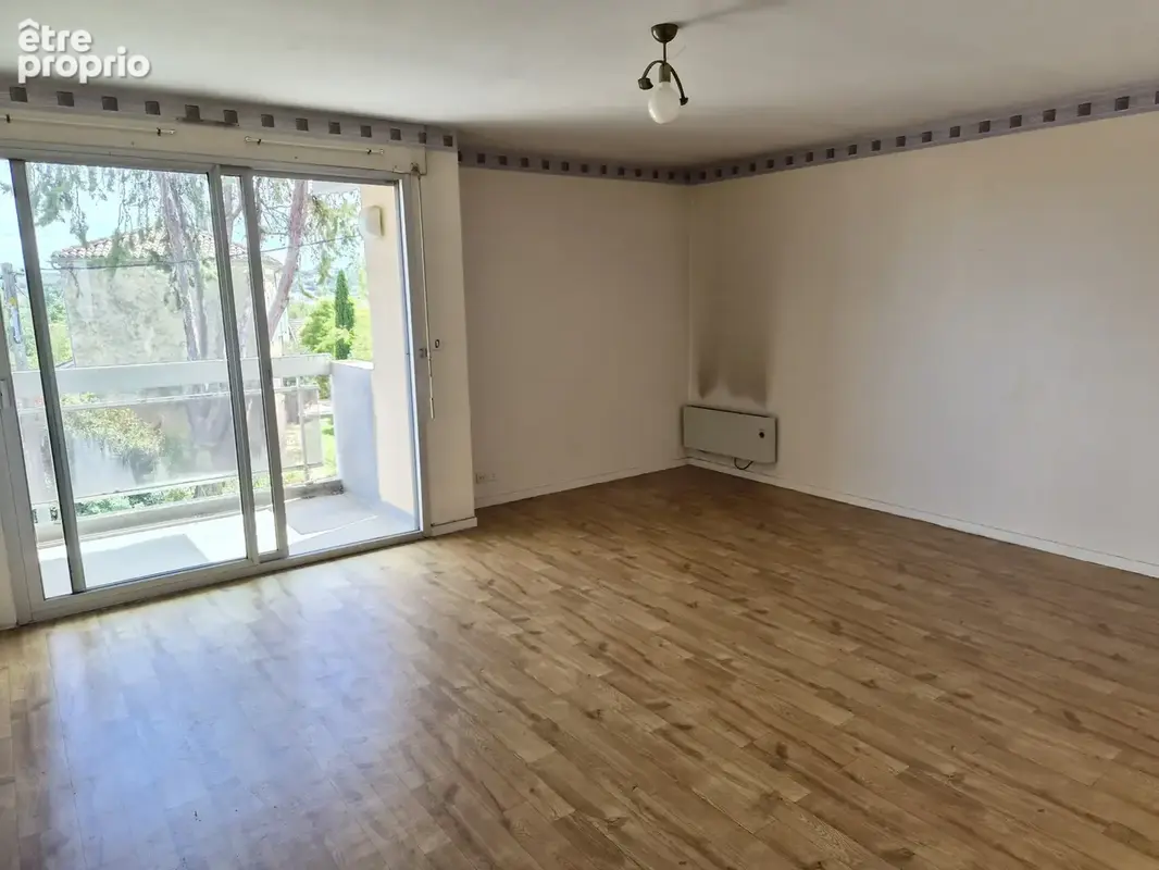 Appartement T3 - 71m2 + balcons, garage et cave - photo 3