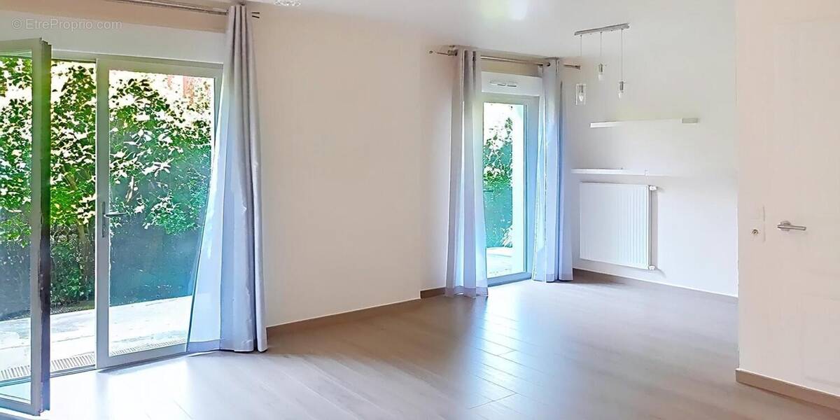 Photo 1 - Appartement à LES PAVILLONS-SOUS-BOIS