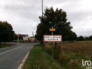 Photo 1 - Terrain à PORT-EN-BESSIN-HUPPAIN