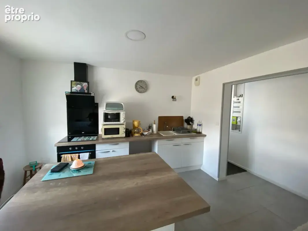 Immeuble avec 3 appartements + local artisanal - photo 8