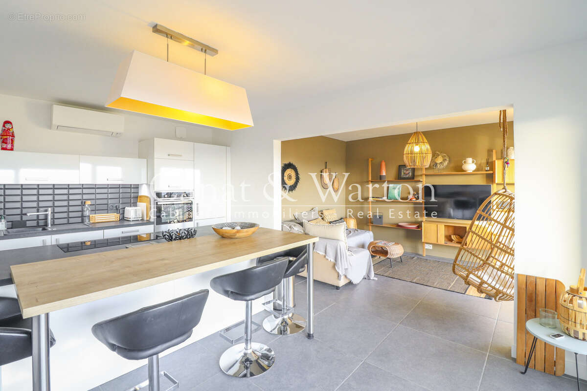 Vue mer exceptionnelle: t 3 rénové en dernier étage avec garage - photo 4
