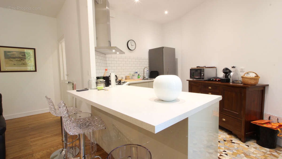 Bel appartement T2 avec ascenseur en centre-ville de Vichy avec cave et mansarde - photo 7