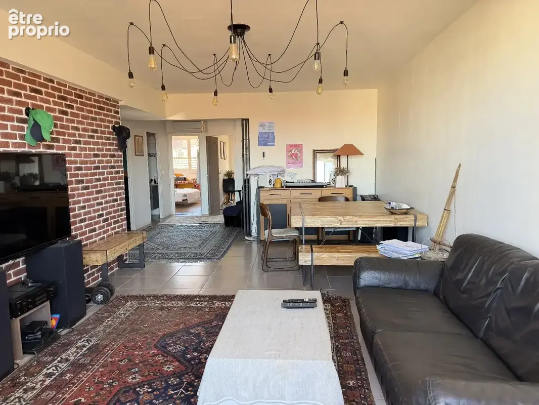 Appartement T3 traversant de 79m² dans un secteur calme. - photo 3