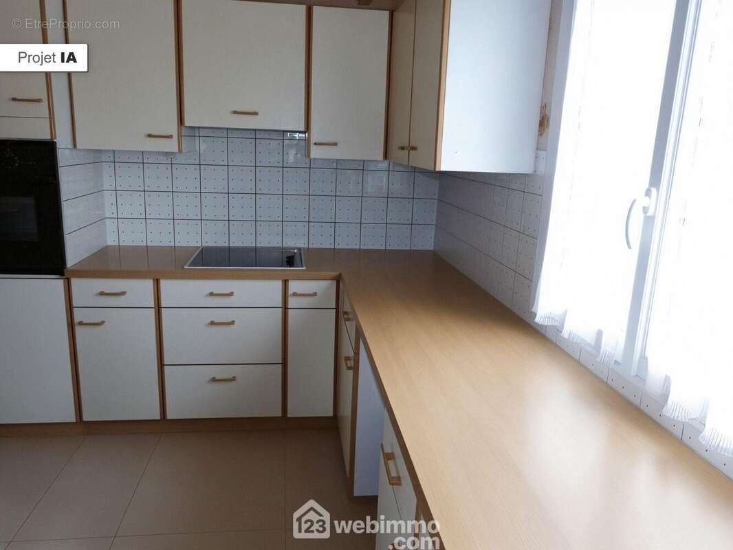 Photo 5 - Maison à SAINT-ETIENNE-DU-ROUVRAY