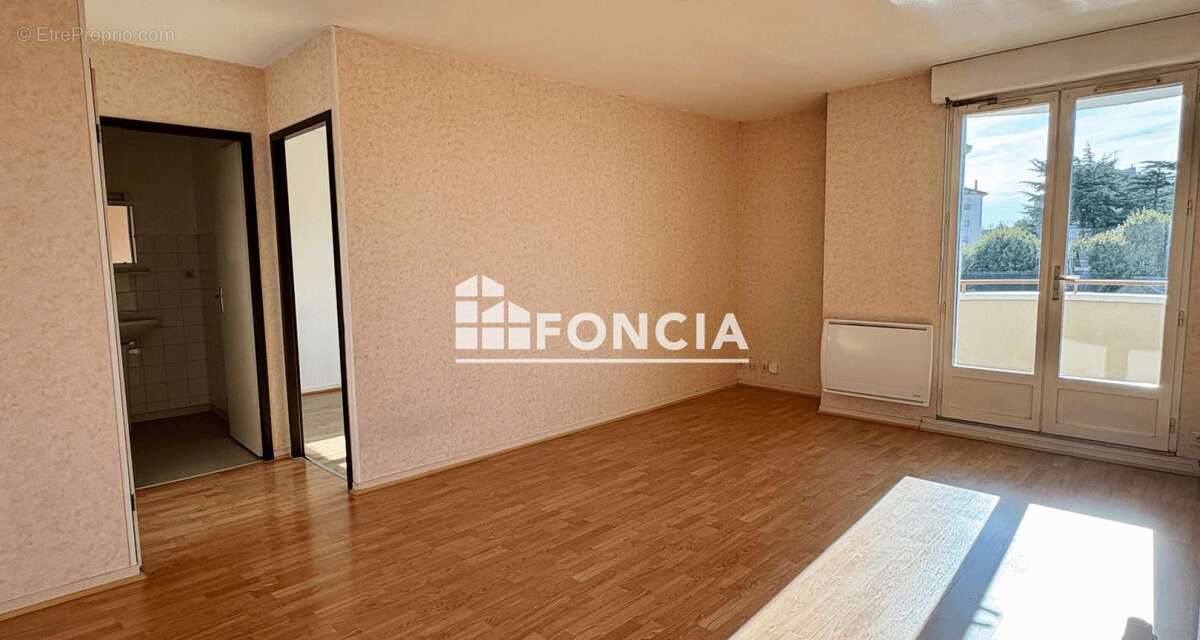 Appartement T2 avec parking et cave - photo 4