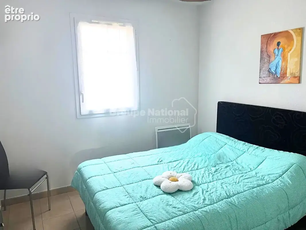 T2 de 44m² climatisé et traversant + 2 places de parkings privatives dans une copropriété prisée - photo 9