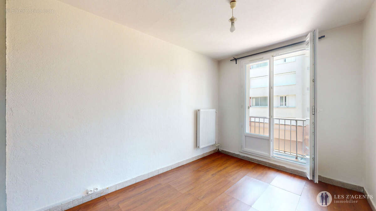 T3 avec balcon dans une copropriété fermée - photo 9
