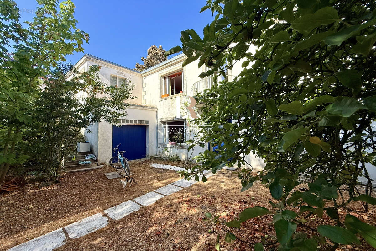 La genette - Demeure de 1850 sur magnifique parcelle arborée - photo 12