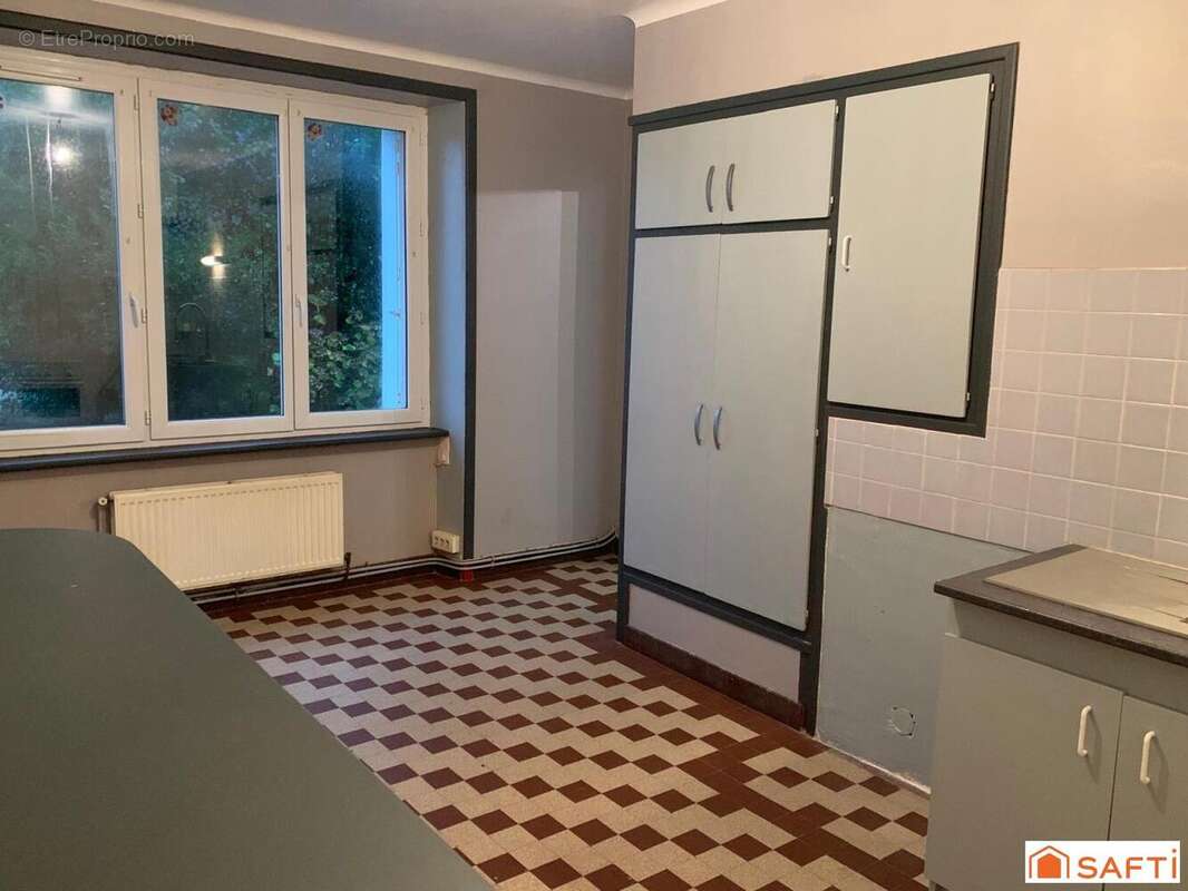 Photo 4 - Maison à CHATEAUNEUF-DU-FAOU