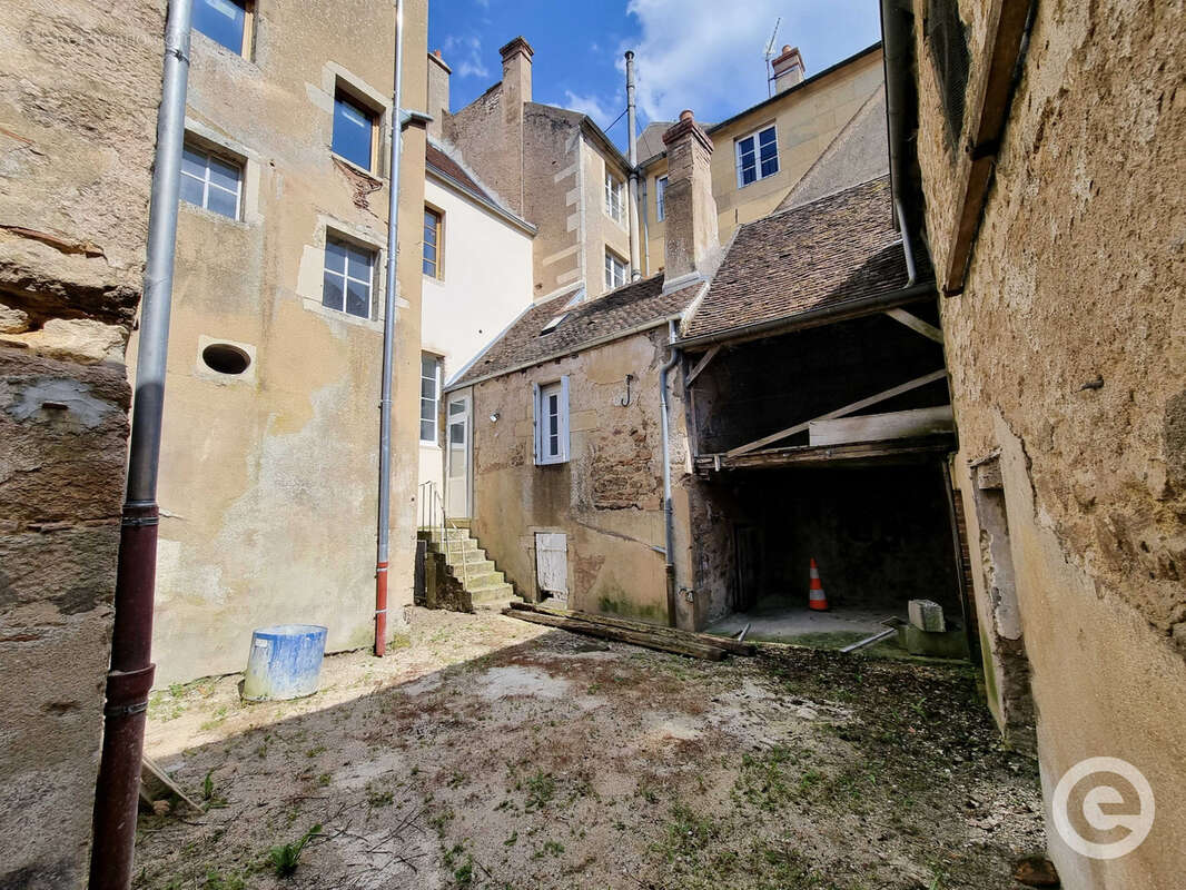 Immeuble de 5 logements au centre-ville d'Avallon avec dépendances - photo 21