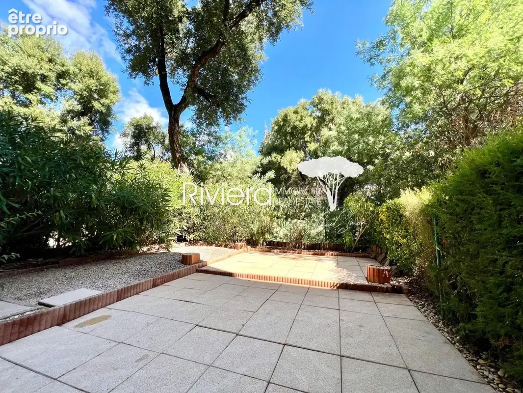 T2 en rez de jardin avec terrasse et parking s/sol ! - photo 2