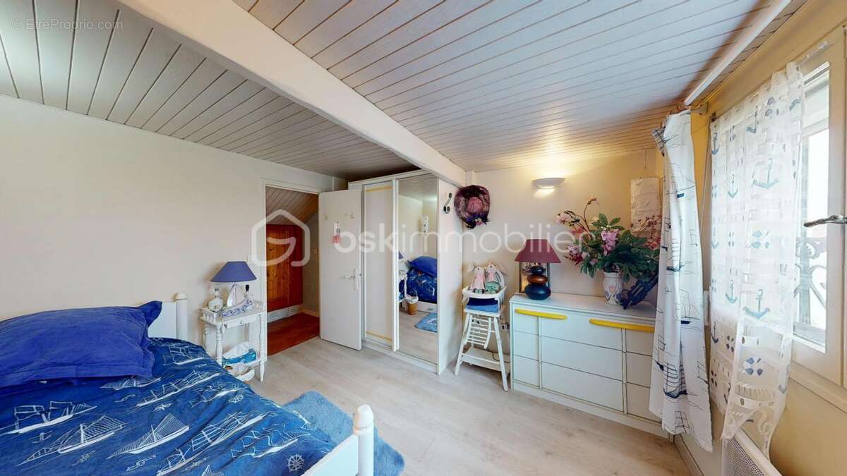 Quartier du Coteau – Maison familiale avec charmant jardin, terrasse, sous-sol total et nombreux stationnements ! - photo 13