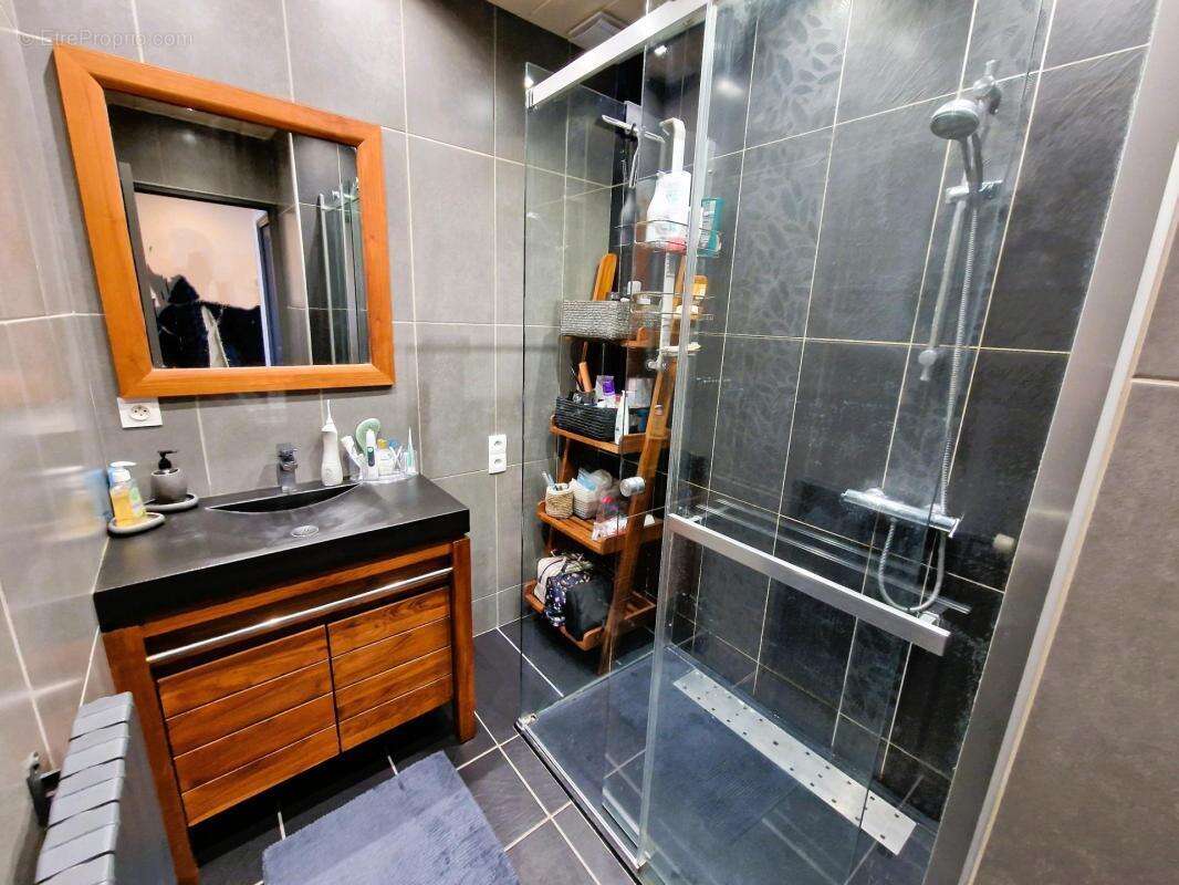 maison de 5 pièces de 124m² - photo 8