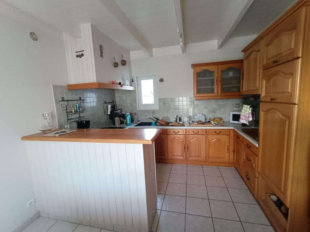 Maison à CHATEAUNEUF-DU-FAOU