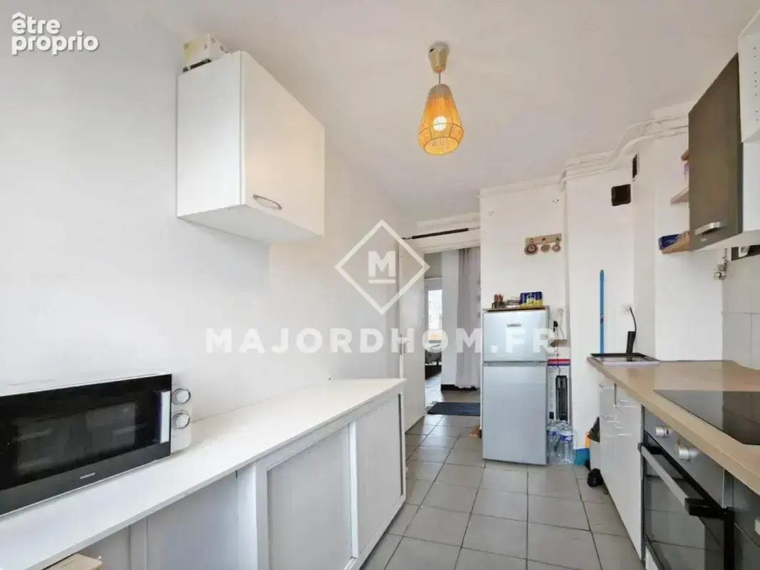 vente type 3 52m² calme ascenseur balcon traversant  13004 - photo 10