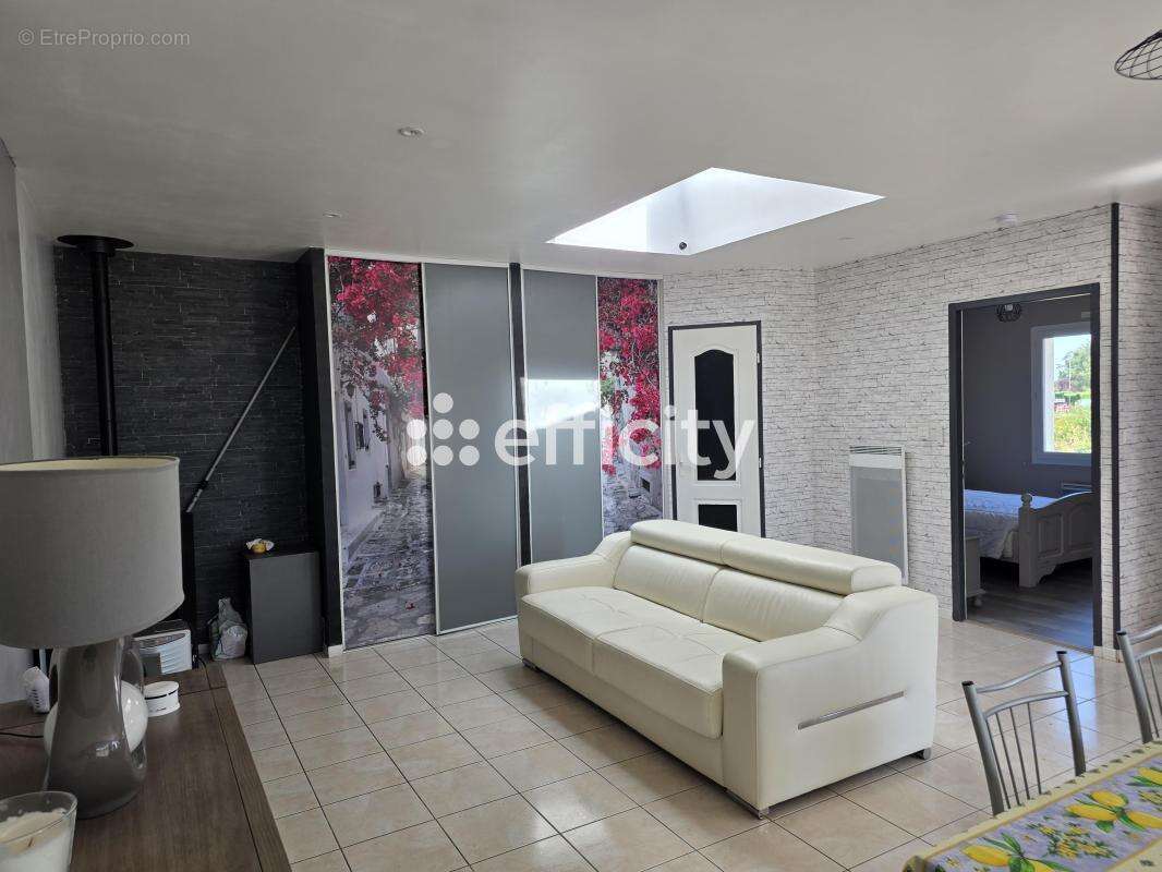 Maison 61 m² à Saint-Laurent-De-La-Pree  - photo 7