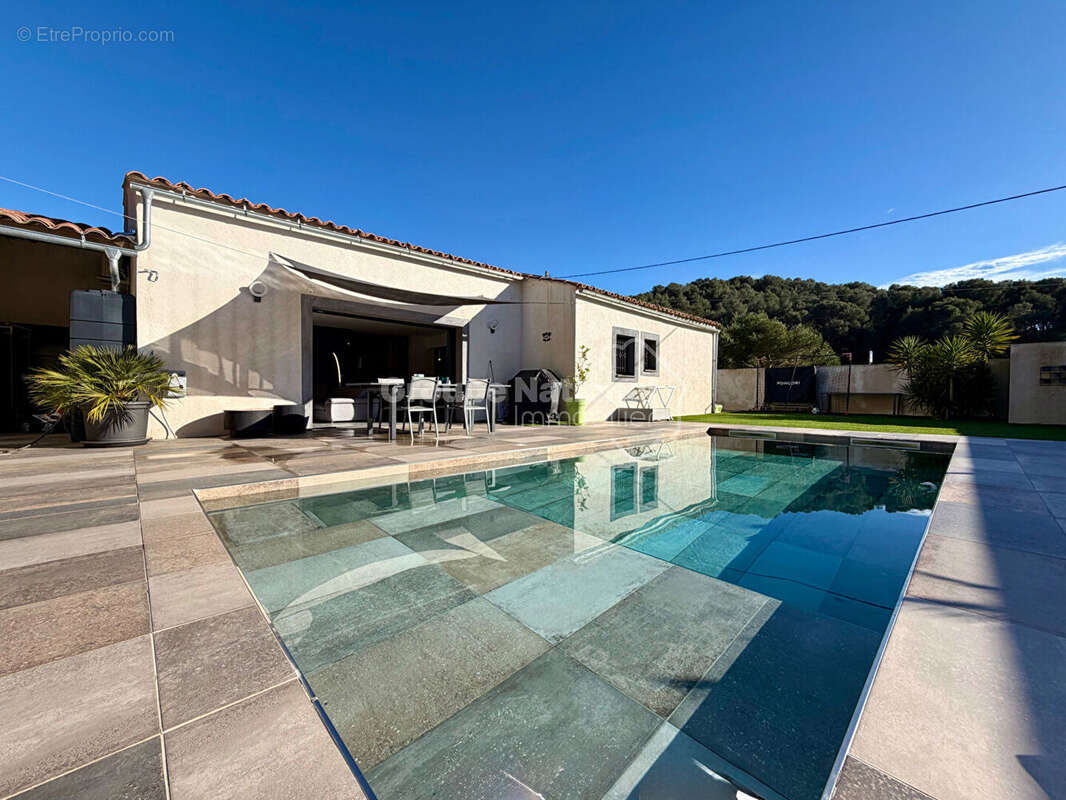 Maison T4/5 de plain-pied avec piscine et double garage - photo 2
