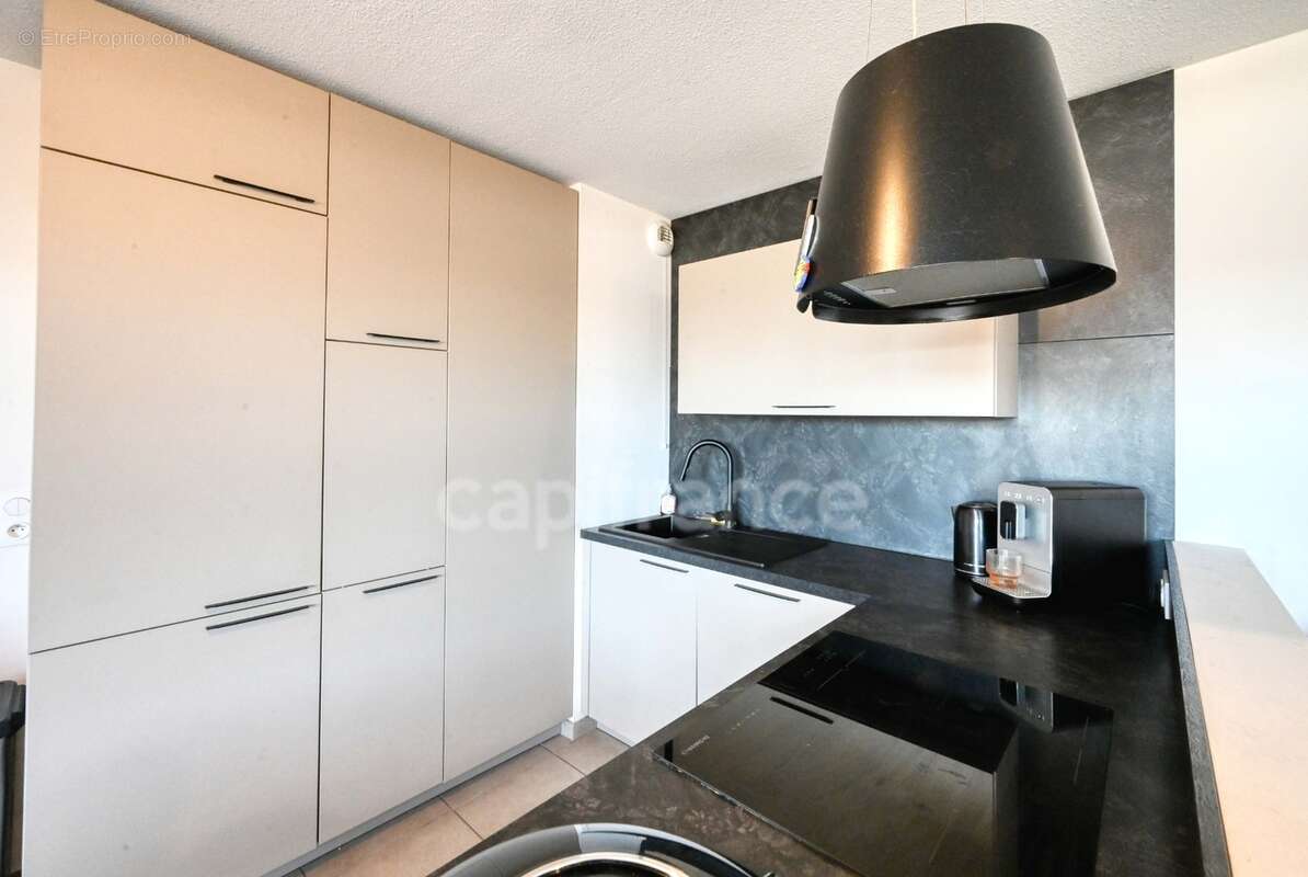 Appartement T3 en résidence sécurisée - photo 4