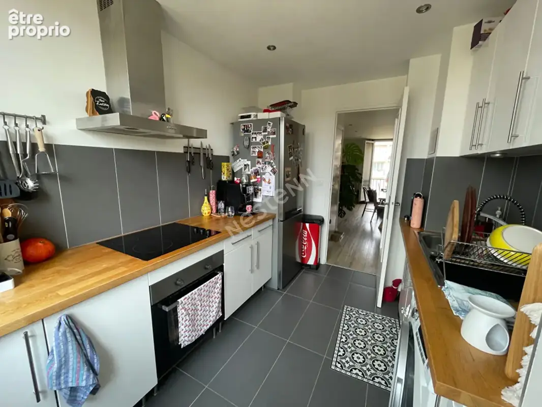 Villeurbanne, les gratte-ciel  t4 de 70 m² avec balcon, cave et stationnement partagé - photo 5
