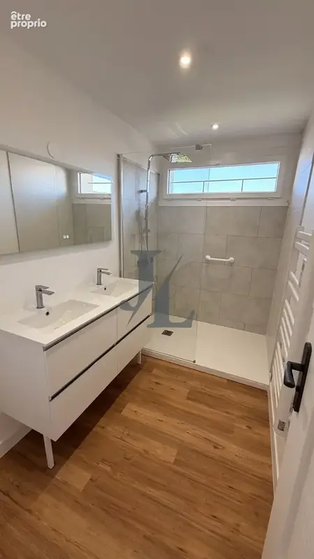 EXCLUSIVITÉ   Appartement de 98 m2 entièrement rénové avec terrasse, cave et stationnements - photo 10