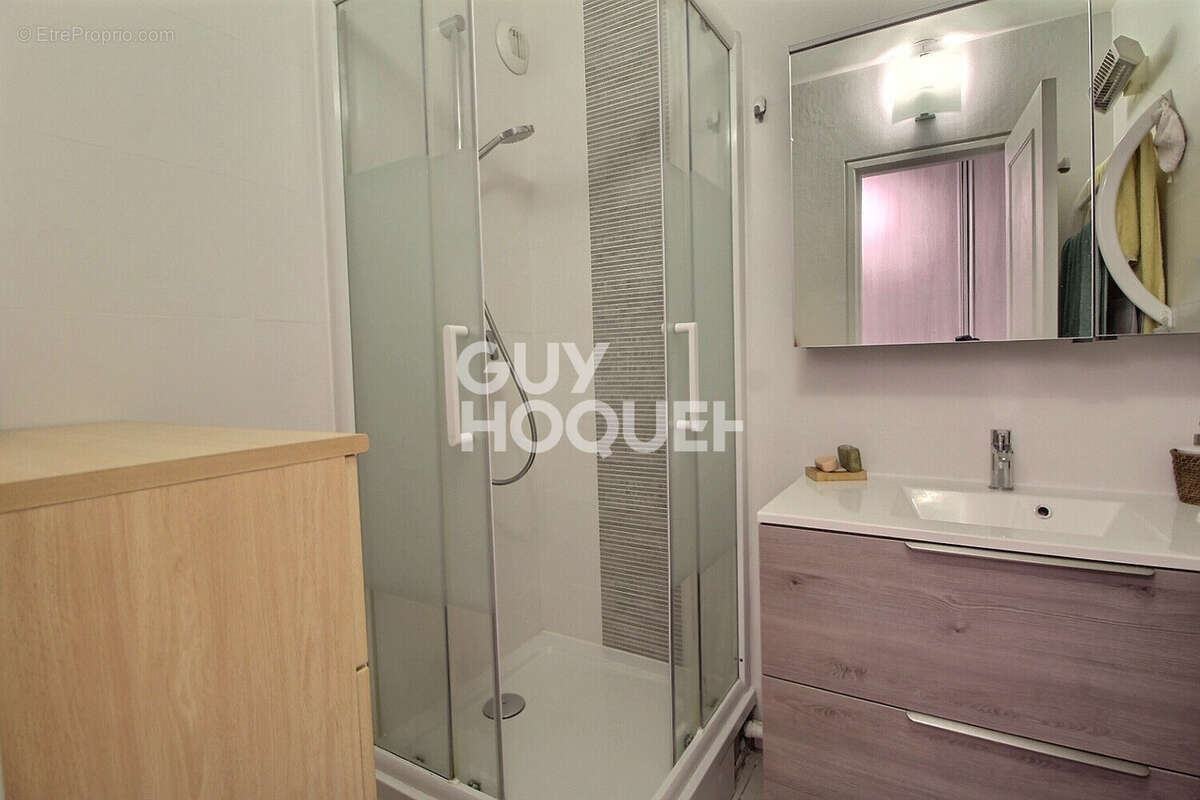 Appartement 4 pièces de 94 m² en rez-de-jardin - photo 7