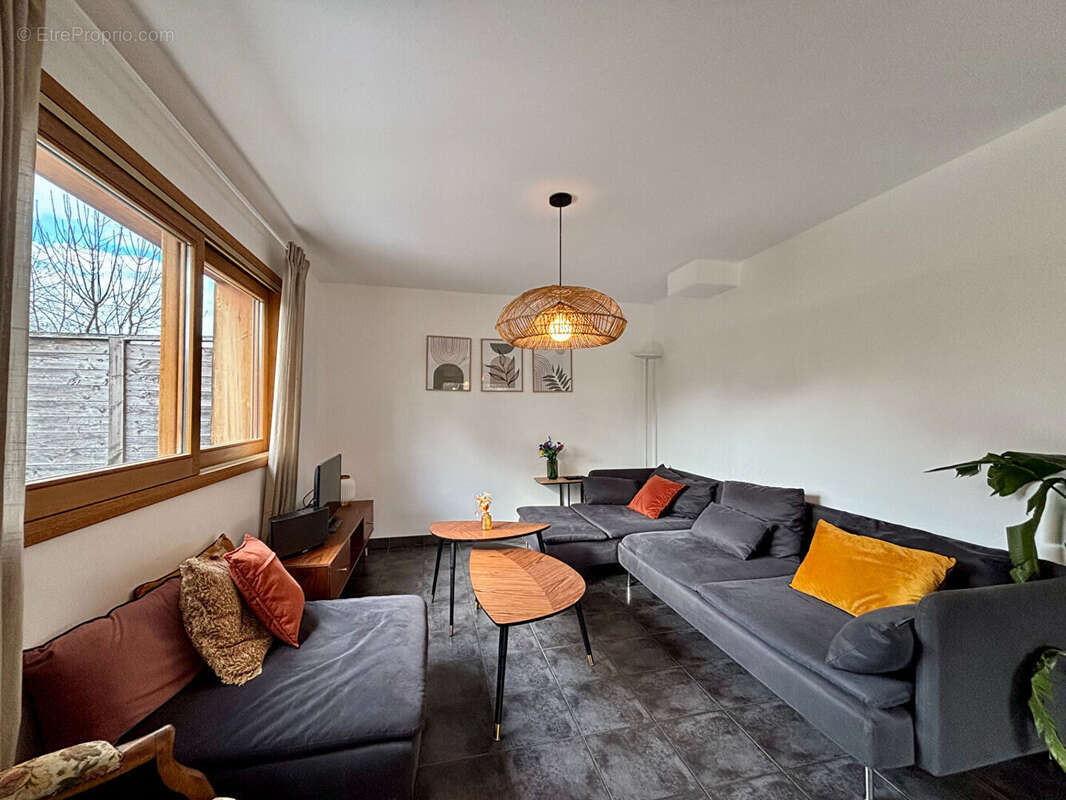 Maison mitoyenne avec jardin et garage - photo 5