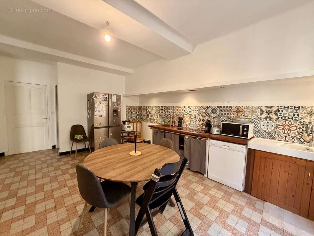 10 mn Villefranche, grande maison de village T5 avec jardin - photo 5