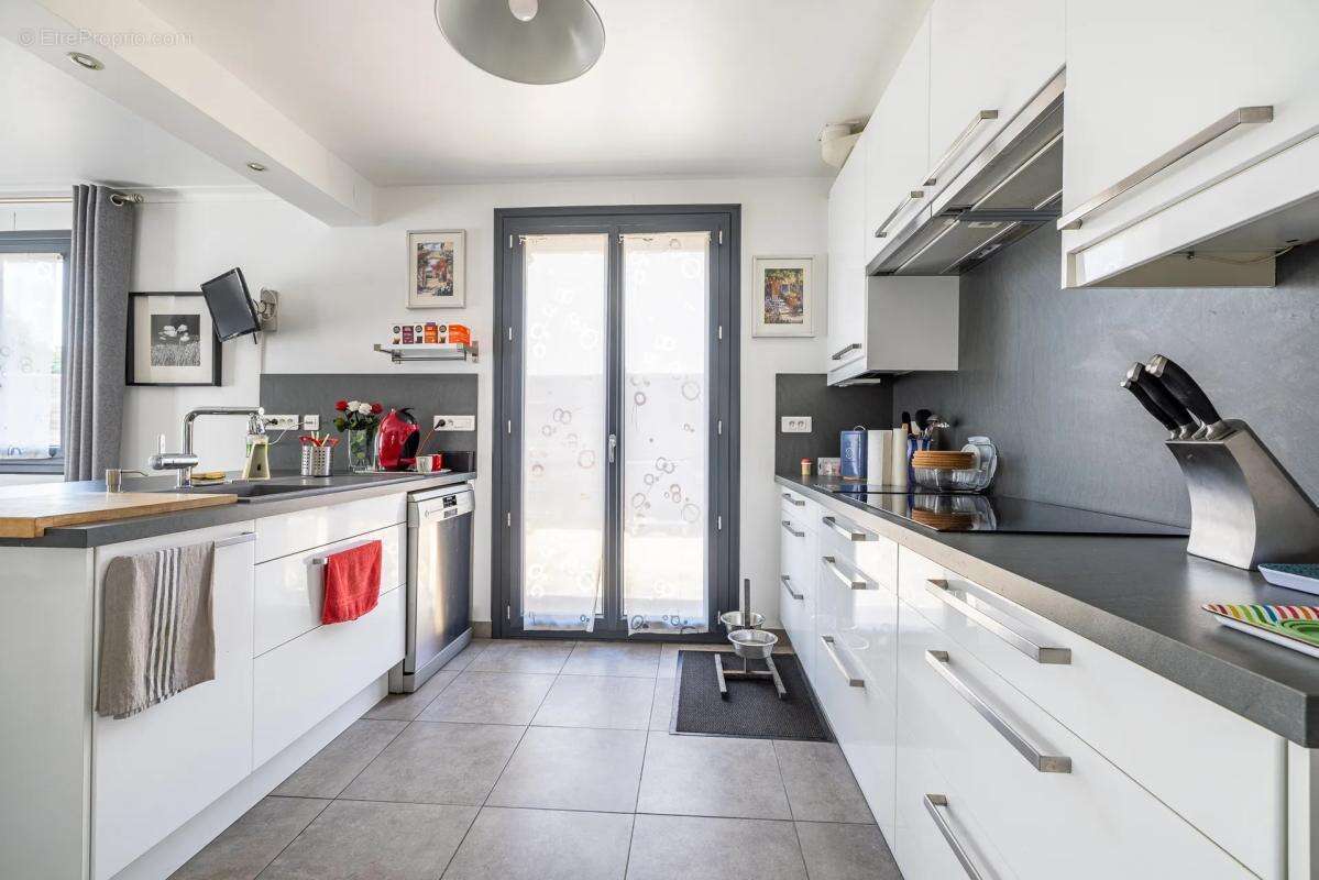 Maison de 5 pièces de 123 m² située à Lisses - photo 7